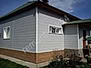 отделка дома сайдингом слайдинг-монтаж